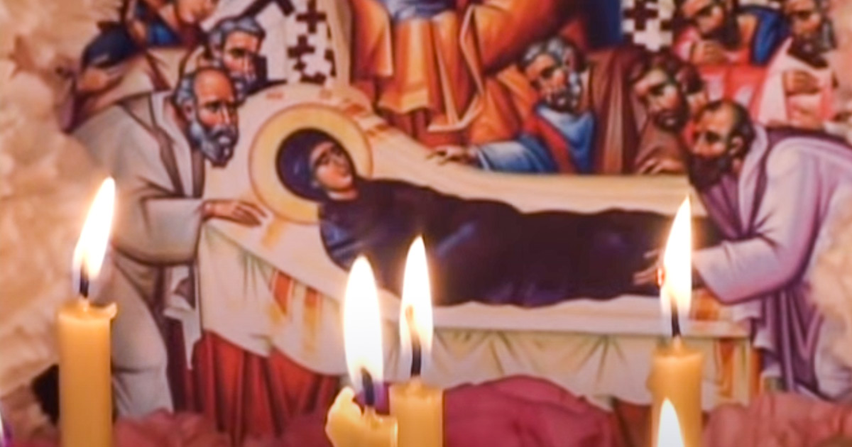 Icono de la Dormición con velas